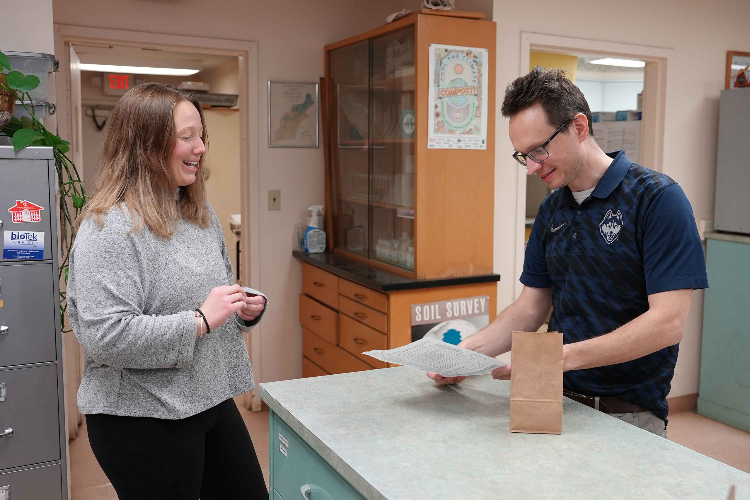 Handing in a form at the center's main welcome desk
